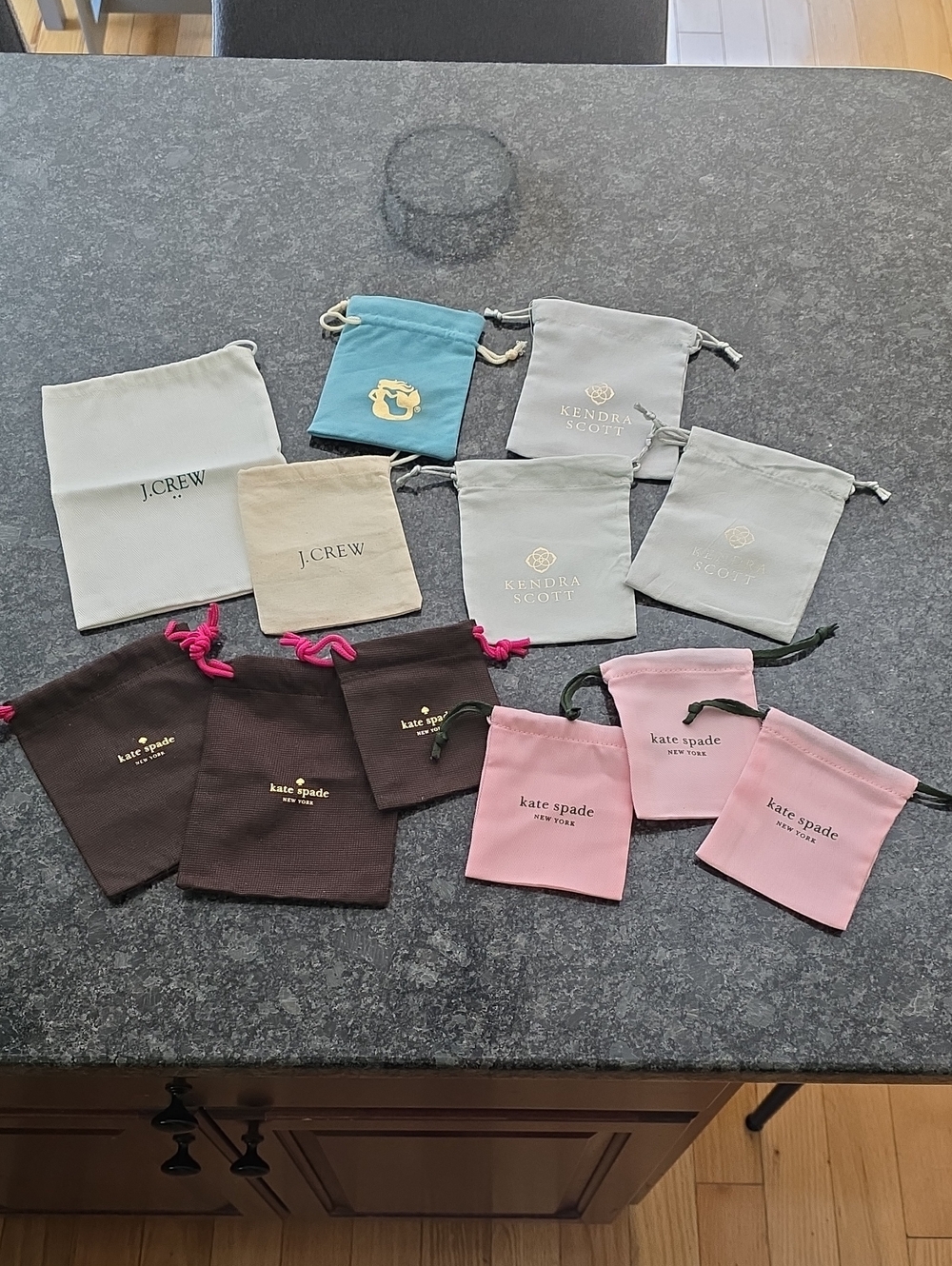 kate spade Pink and Brown Drawstring Jewelry Pouches